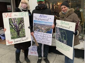 Kathleen O'Hara, Robert Macinnes and Mary Farrar were out on Princess Street on Thursday, Nov. 25, 2021, collecting signatures to stop the clearcutting of the Davis Tannery lands. Brigid Goulem/The Kingston Whig-Standard/Postmedia Network