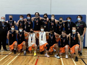 Members of the Lasalle Lancers boys volleyball team celebrate their OFSAA bronze medal.