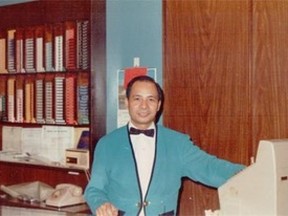 •	11076232 – Photograph from May 22, 2015, Edmonton Journal – Sam Chow at McNamara Café till, year uncertain. Notice the open display of cigarettes. Sam and Frank Mah, associates at the McNamara Hotel continued when they established the Golden Palace Restaurant next door on the north side of the Mac. After a while, it was Sam, wife Quiny, with the help of their children, who perpetuated the legacy of hard work, kindness, and service until illness and 1993 fire curtailed restaurant’s existence.