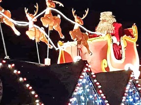 Santa made his way through town last year and will be doing it all over again this weekend. (file photo)
