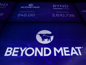 FILE PHOTO: The company logo and trading information for Beyond Meat is displayed on a screen during the IPO at the Nasdaq Market site in New York, U.S., May 2, 2019. (REUTERS/Brendan McDermid/File Photo)