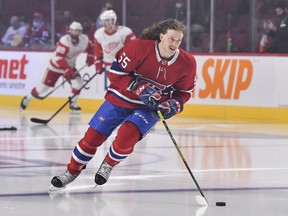 Michael Pezzetta of the Montreal Canadiens leads the team out for warmups prior to his first career NHL game against the Detroit Red Wings at Centre Bell on November 2, 2021, in Montreal, Quebec.  (Photo by Minas Panagiotakis/Getty Images)