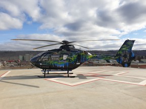 A helicopter from Local HERO Foundation sits on the helipad outside the Northern Lights Regional Health Centre on Friday, March 29, 2019. Cameron Spring/Supplied Image