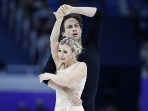 Canada's Kirsten Moore-Towers and Michael Marinaro in action during the pairs' free skate at the ISU Grand Prix of Figure Skating’s Rostelecom Cup in Sochi, Russia, on Nov. 27, 2021. (REUTERS/Evgenia Novozhenina)