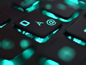 This file photo illustration picture taken on June 25, 2019 shows a close-up view of a computer keyboard.