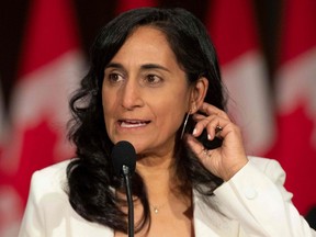 Newly sworn in Minister of National Defence Anita Anand speaks during a press conference in Ottawa, Oct. 26, 2021.