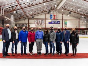 City officials joined representatives of Aspen Custom Trailers on Nov. 10 to celebrate the company’s sponsoring of an arena at the Leduc Recreation Centre. (City of Leduc)