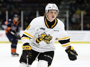 Sarnia Sting's Nolan Dann (9) plays against the Flint Firebirds in the first period at Progressive Auto Sales Arena in Sarnia, Ont., on Friday, Nov. 26, 2021. Mark Malone/Chatham Daily News/Postmedia Network