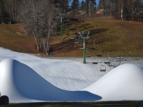 Mounds of snow produced by the snow making equipment at Snow Valley Ski Club sit at the bottom of the hill waiting for the right conditions to be pushed across the landscape in Edmonton, November 1, 2021. Ed Kaiser/Postmedia