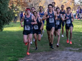 McMaster Marauders' Andrew Davies of Sarnia, Ont., leads the men's race at the OUA cross-country championships at the Thames Valley Golf Course in London, Ont., on Saturday, Nov. 6, 2021. Davies won the individual gold and led the McMaster men to a team silver. (Muad Issa/McMaster Marauders)