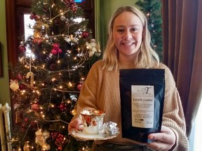 The Billy Bishop Musem will be hosting Victorian Teas for the next three Wednesdays and Christmas open houses this Saturday and Sunday. Museum curator Emily Jolliffe holds the latest tea blend, Lovely Louise, made especially for the museum. She's standing in the Bishop family dining room in Owen Sound, Ont. on Wednesday, Nov. 24, 2021. (Scott Dunn/The Sun Times/Postmedia Network)