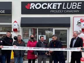 Manny Dhillon cuts the ribbon at the Rocket Lube grand opening. From L-R: David Prang and Ken McNaughton from Chamber of Commerce Brantford Brant, councillors Richard Carpenter and Cheryl Antoski, Manny Dhillon and mayor Kevin Davis. SUPPLIED