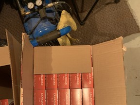 Hanna and Drumheller RCMP seized 326 cartons of cigarettes from a Hanna residence after a three-week-long investigation.  Hanna RCMP photo