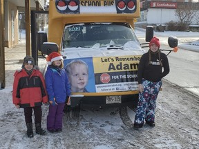 The Let’s Remember Adam Campaign – Fill the Bus Food & Toy Drive. Santa's helpers (left) Alex, (middle), Zoey, (Right) Lily.
