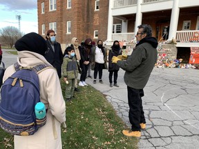 A group of Muslim youth ending a multi-week program to educate them on Indigenous history and culture, met with Geronimo Henry outside the former Mohawk Residential School on Saturday. Henry was placed in the school by his mother, spending 11 years there and told the visitors what it was like.