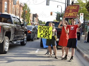 A rally to fight climate change drew about 100 people, including these people on the street in front of city hall on Friday, Sept. 20, 2019 in Owen Sound. Scott Dunn/The Owen Sound Sun Times/Postmedia Network