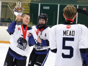 Members of the  Nickel City Sons celebrate after defeating the  North Central Predators during Big Nickel Hockey Tournament U12 Final action on Sunday afternoon. Nickel City Sons defeated the  North Central Predators
5-2.Gino Donato/The Sudbury Star