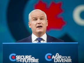 Conservative Leader Erin O'Toole addresses supporters at the Tribute Communities Centre Arena in Oshawa, Ont. following the federal election, Sept. 21, 2021.