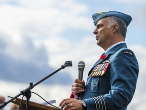 Col. Ryan Deming, Wing Commander at CFB Trenton, speaks to the crowd Thursday afternoon as Highway of Heroes celebrates the 175 trees recently planted in memory of Canada's fallen military heroes. In Trenton, Ontario. ALEX FILIPE