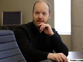 Aaron Bell takes part in a Downtown DocFest workshop Sunday, March 1, 2015 at the Belleville Public Library. He suffered a heart attack and stroke on Saturday, a friend said, and there's now a fund to gather donations to help him and his family through the recovery process.