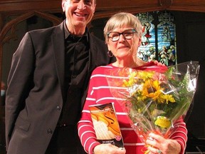 Violinist with the New Orford String Quartet and Prince Edward County Chamber Music Festival co-artistic director Brian Manker, and festival board chair Maureen Dunn share a congratulatory bouquet of flowers at the end of this yearÕs festival Sunday afternoon in St. Mary Magdalene Anglican Church. JACK EVANS PHOTO