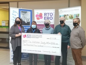 The Alzheimer Society's Angela Meraw, left, and Jennifer Loner accepted a cheque from the RTO/ERO's Marg Werkhoven, Gerald Watts and David Fox.