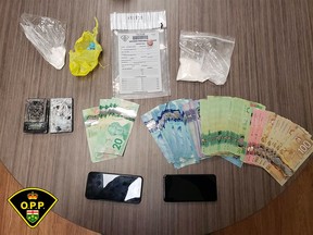 Cocaine, fentanyl cash and drug paraphernalia seized during the execution of a search warrant on Adrian Court in Trenton, November 18. OPP PHOTO