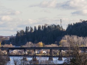 A CN railway passing over the Trent river is seen from the a hill atop the Mount Evergreen Cemetery.  ALEX FILIPE