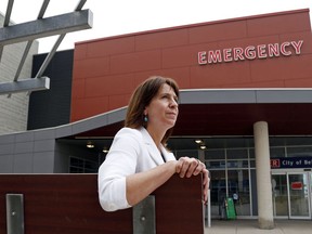 Quinte Health Care president and chief executive officer Stacey Daub, shown in July outside the emergency department of Belleville General Hospital, says the pandemic continues to mean a heavy workload at Ontario hospitals and rising COVID-19 rates are expected to increase that load.