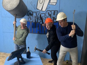 Mike Smith (left), CEO of RPlaces Transition Centre, Jenn Hatfield, a Six Nations Polytechnic student, and Lance Calbeck, president of the centre's board of directors, get ready for Smash Mania, a fundraiser planned for Dec. 3-5.