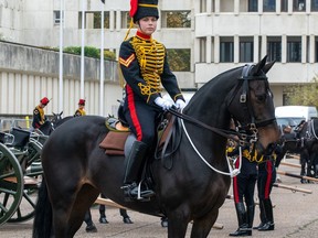 Master Bombardier Haleigh Vanderpost is in her full-dress blue uniform on parade day in England. A member of the 56th Field Artillery Regiment, Vanderpost spent the past eight weeks in England participating in a ceremonial military commemorations and celebrations.