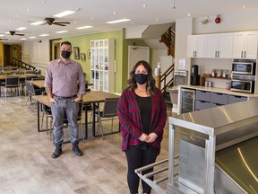 Executive director Michael Shewburg and general manager Mallory Biggs stand in the renovated dining room at Five Oaks retreat centre in Paris, Ontario.