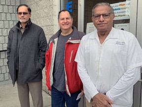 Mazher Latif (left) and Anwar Dost (right), of the Muslim Association of Brantford, and Rev. Paul Shepherd, of Sydenham-United Heritage Church, are urging people to contribute to Canadian Red Cross relief efforts in support of British Columbia residents devastated by flooding and mudslides.