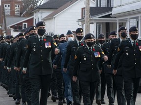 A Kingston contingent made up off staff and students from the Canadian Forces School of Communications and Electronics Foxtrot Troop march through Westport as they exercise the Freedom of the Village before the annual Remembrance Day ceremony.