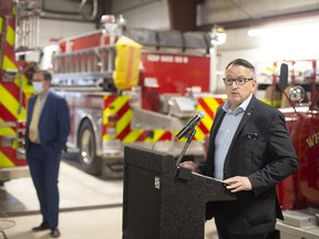 Greg Rickford, Ontario's minister of northern development, mines, natural resources and forestry, holds a press conference with Chatham-Kent Mayor Darrin Canniff (let) at the Chatham-Kent Fire Station in Wheatley on Nov. 17. DAX MELMER/Windsor Star