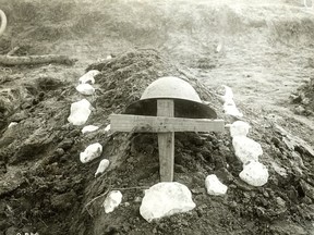 The makeshift grave of a Canadian soldier, buried on the battlefield at Vimy Ridge by his comrades. Nearly 3,500 Canadians were listed as dead or missing after the four-day battle, a relatively low casualty toll by the standards of the First World War. George Metcalf Archival Collection, Canadian War Museum