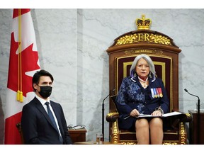Prime Minister Justin Trudeau looks on as Governor General Mary May Simon delivers the throne speech in the Senate on Tuesday.
