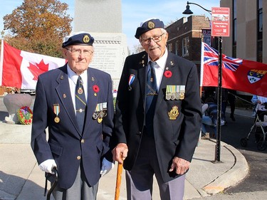Royal Canadian Navy veterans Karl Ryckman, 90, left, and Cecil Massender, 89, both did tours of duty in the Korean War, serving on destroyers. They are seen here Thursday following a Remembrance Day ceremony at the cenotaph in downtown Chatham. ELLWOOD SHREVE Photo/Chatham Daily News/Postmedia.