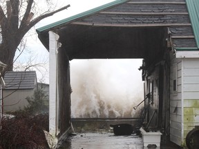 A wave crashes into the breakwall of this property on Erie Shore Drive. (File photo/Ellwood Shreve)