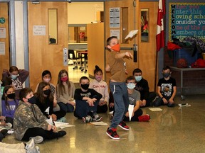 Kalum Moorhouse is one of several Grade 6 students at Dresden Area Central School who enjoyed the hands-on experience of a paper airplane project assigned by their teacher Blair Charlton. ELLWOOD SHREVE PHOTO/Chatham Daily News/Postmedia