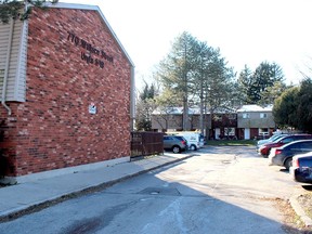 Neighbours said a shooting took place in the parking lot of this multi-housing dwelling on Wallace Street in Wallaceburg, Ont. on Sunday night. ELLWOOD SHREVE/Chatham Daily News/Postmedia