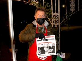 Wayne White was among the numerous volunteers who took part in the annual Porchlight fundraiser Monday night by going door-to-door collecting donations. This year's effort raised $50,087 for the annual Chatham Goodfellows No Child Without A Christmas campaign. ELLWOOD SHREVE PHOTO/Chatham Daily News/Postmedia