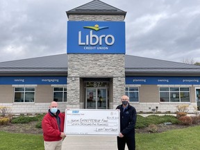 Libro Credit Union recently announced a gift of $7,500 to the Huron Entrepreneur Fund. Above from left, Bryan Vincent, chair of the Huron Entrepreneur Fund, receives the cheque from Marty Rops, regional manager of Libro Credit Union's Huron-Perth region. Handout