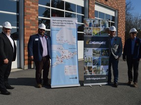 From left to right, Jean-Benoit Trahan, director of eastern region operations and Gazifère (a subsidiary of Enbridge Gas), acting Mayor of South Glengarry Lyle Warden, Minister of Energy Todd Smith and Stormont-Dundas-Glengarry MPP Jim McDonell. The men announced a natural gas expansion project in the Glendale subdivision on Monday November 8, 2021 in Glen Walter, Ont. Shawna O'Neill/Cornwall Standard-Freeholder/Postmedia Network