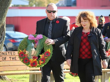 South Stormont Mayor Bryan McGillis and Coun. Jennifer MacIsaac, with a wreath to be placed near the base of the   Ingleside Cenotaph. Photo on Sunday, November 7, in Ingleside, Ont. Todd Hambleton/Cornwall Standard-Freeholder/Postmedia Network