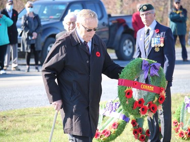 Lost Villages Historical Society president Jim Brownell, representing the Canadian government in carrying a wreath to be placed at the ceremony in Lakeview Heights. Photo on Sunday, November 7, in Long Sault, Ont. Todd Hambleton/Cornwall Standard-Freeholder/Postmedia Network