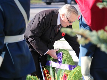 Lost Villages Historical Society president Jim Brownell, representing the provincial government in placing  a wreath at the ceremony in Lakeview Heights. Photo on Sunday, November 7, in Long Sault, Ont. Todd Hambleton/Cornwall Standard-Freeholder/Postmedia Network