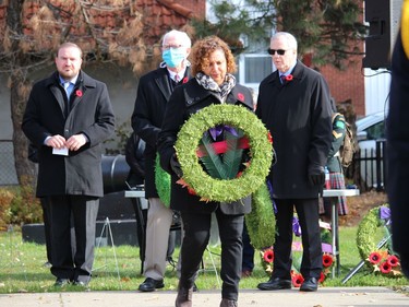 Senator Bernadette Clement carrying a wreath toward the cenotaph. Photo on Thursday, November 11, 2021, in Cornwall, Ont. Todd Hambleton/Cornwall Standard-Freeholder/Postmedia Network