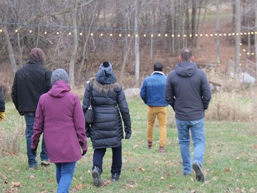 Lee Theodore, one of the tour guides, leads guests toward the stream at Springfield Farm. Photo on Tuesday, November 23, 2021, in Apple Hill, Ont. Todd Hambleton/Cornwall Standard-Freeholder/Postmedia Network
