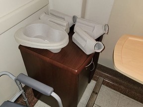A patient-provided photo of a commode and urine container at Cornwall Community Hospital.Handout/Cornwall Standard-Freeholder/Postmedia Network